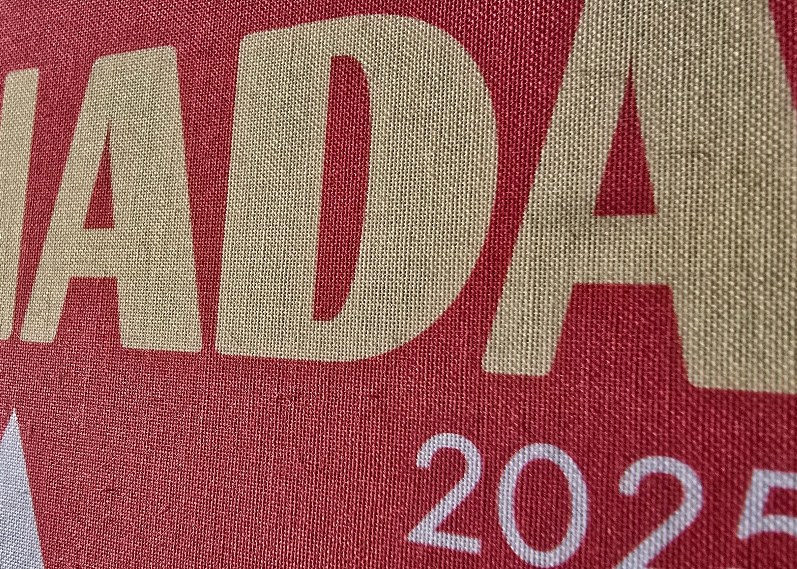 Text 'CANADA 2025' on a red background