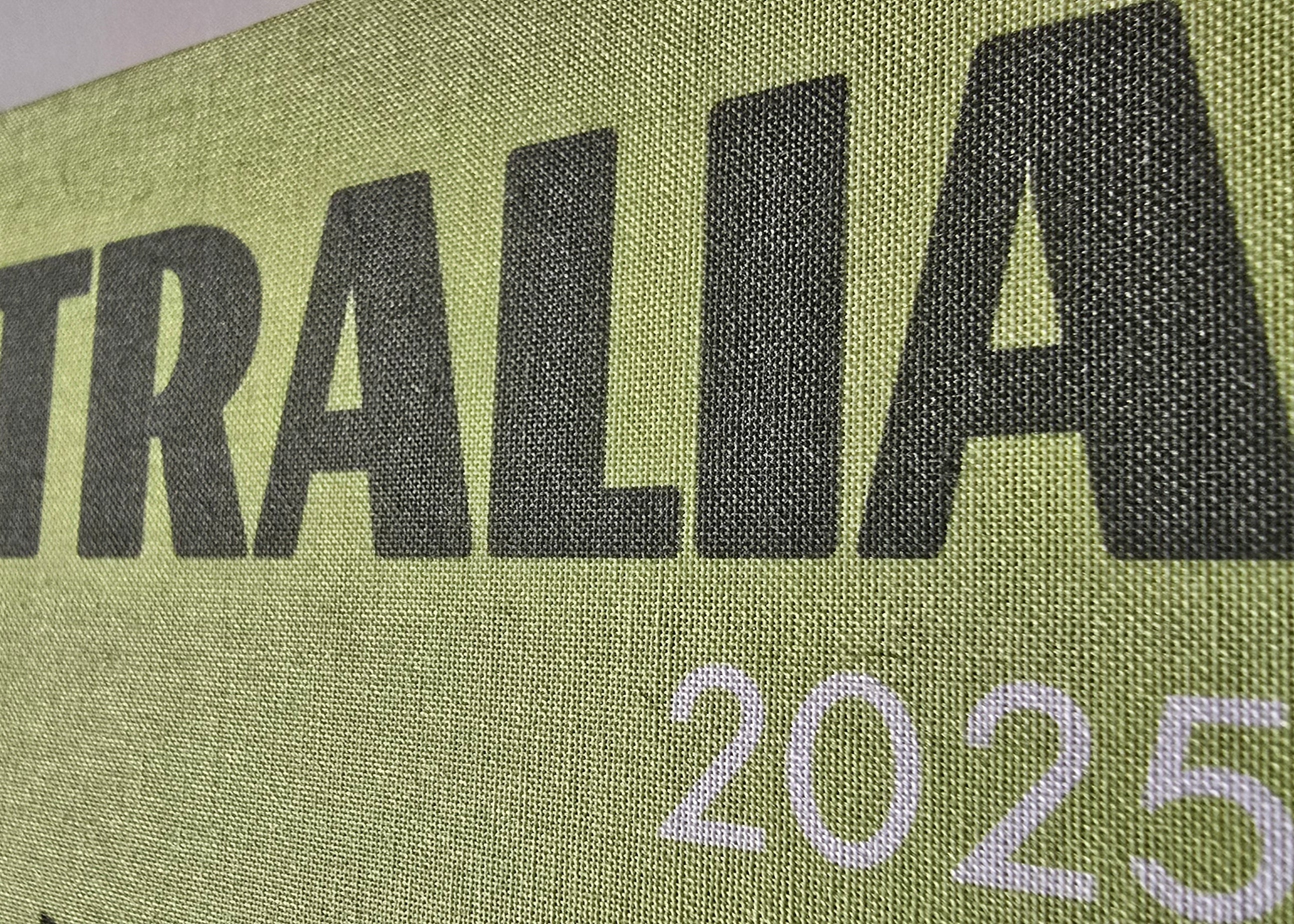 Text 'AUSTRALIA 2025' on a green background