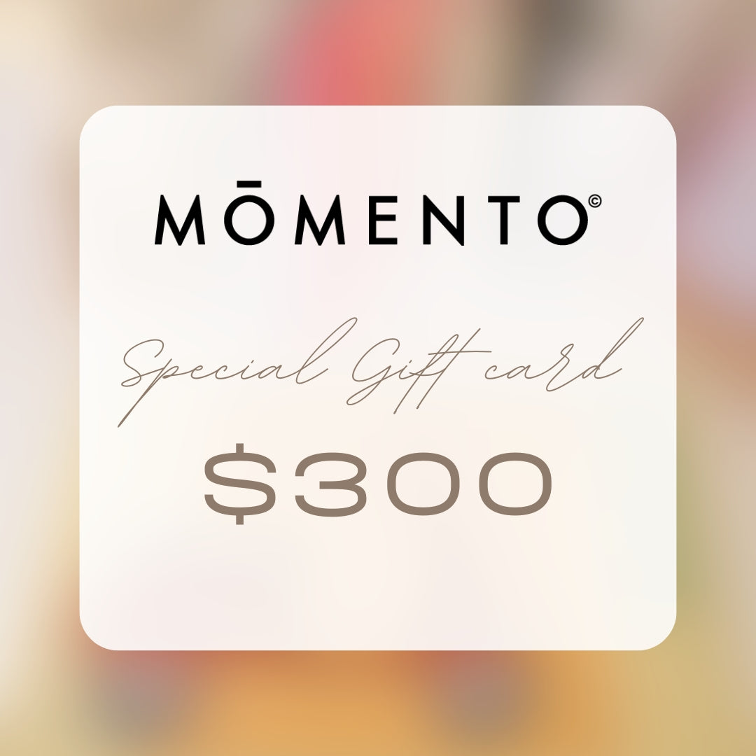 Momento $300 gift card on a blurred background