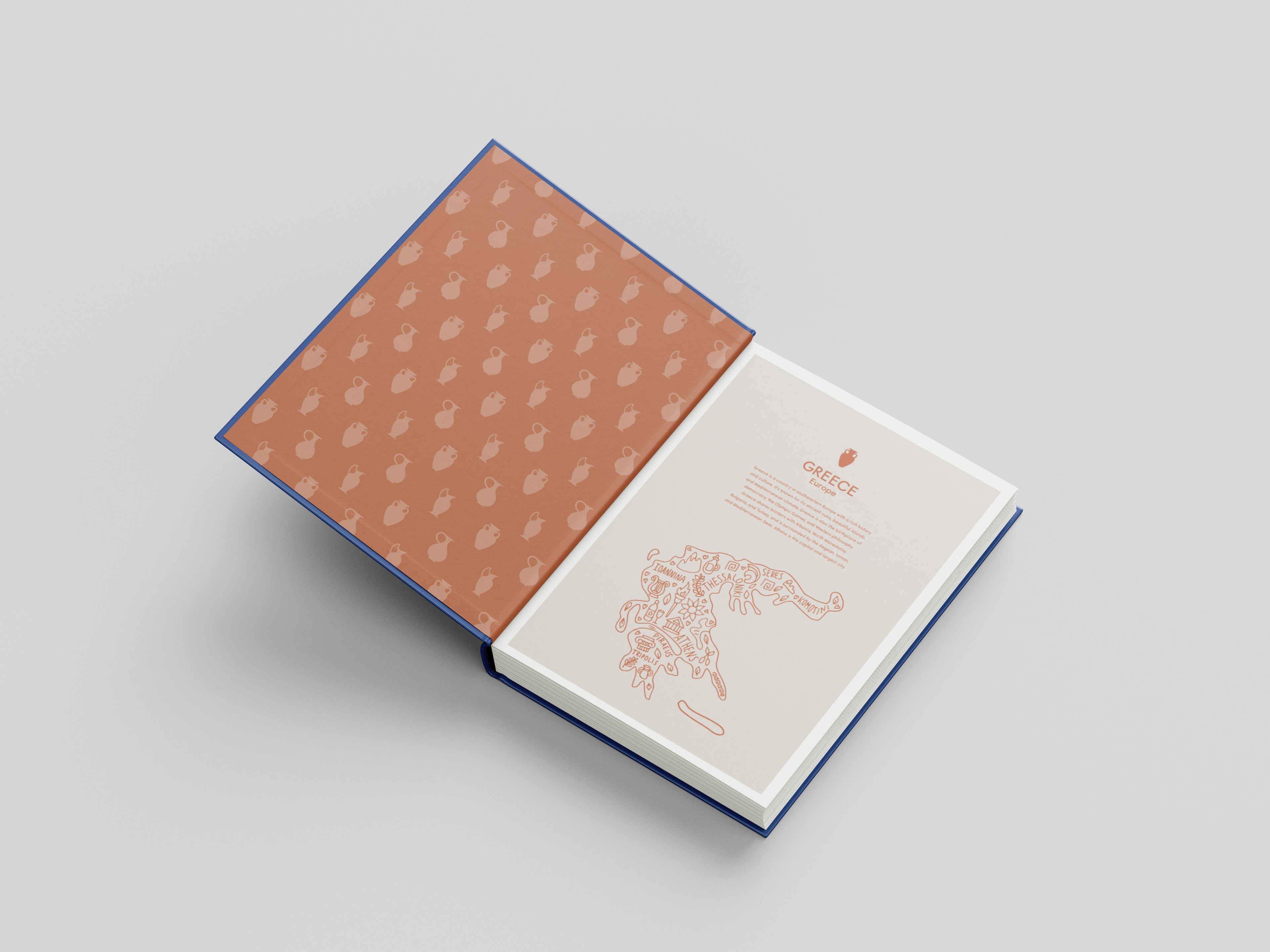 Open book with a patterned cover on a light gray background