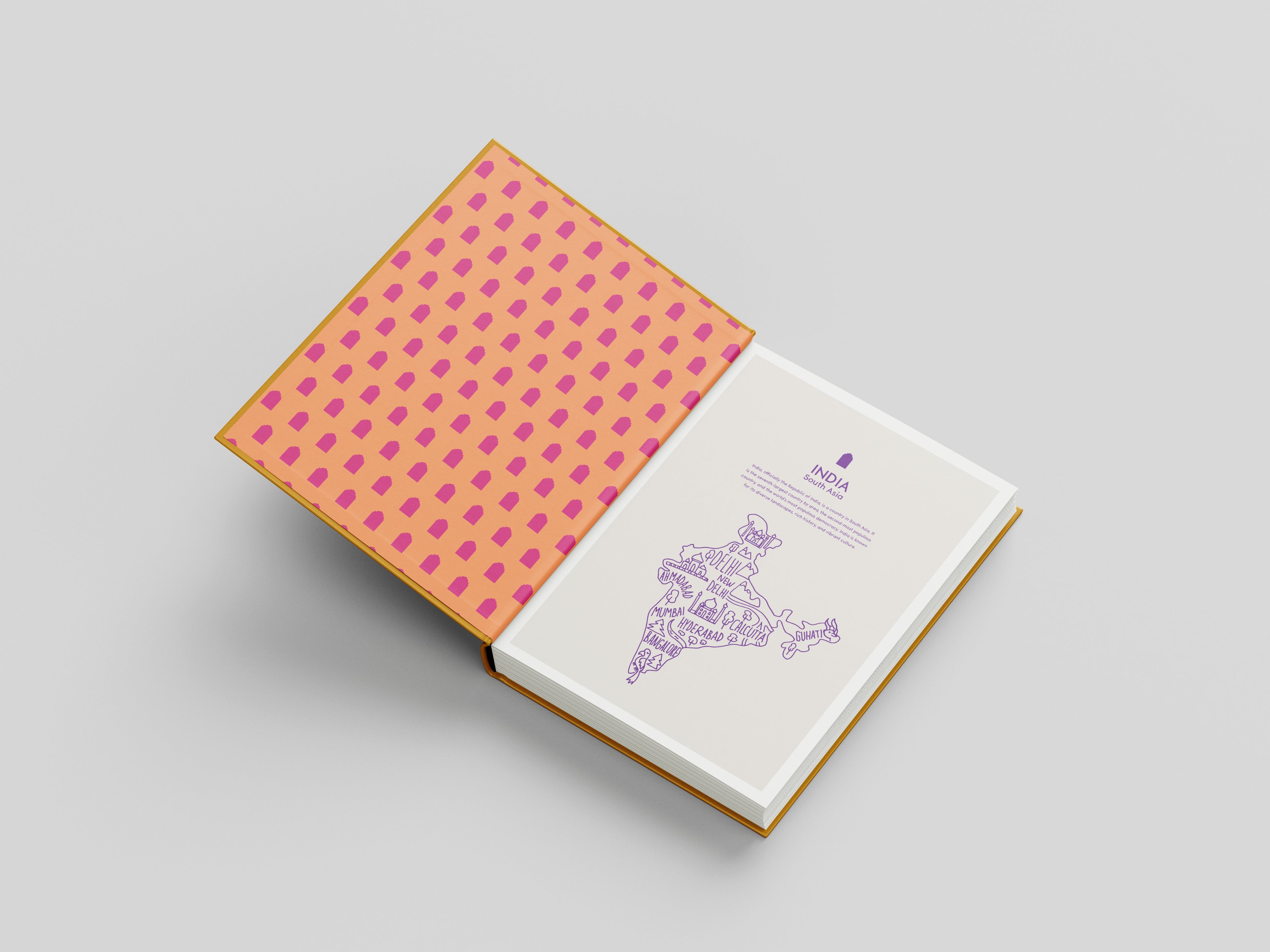 Book with a pink polka dot cover on a gray background