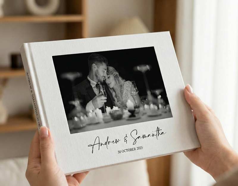 holding wedding photobook